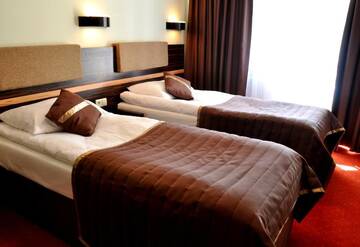 Фото номера Двухместный номер с 2 отдельными кроватями Отель Hotel nad Wigrami г. Gawrych Ruda 10
